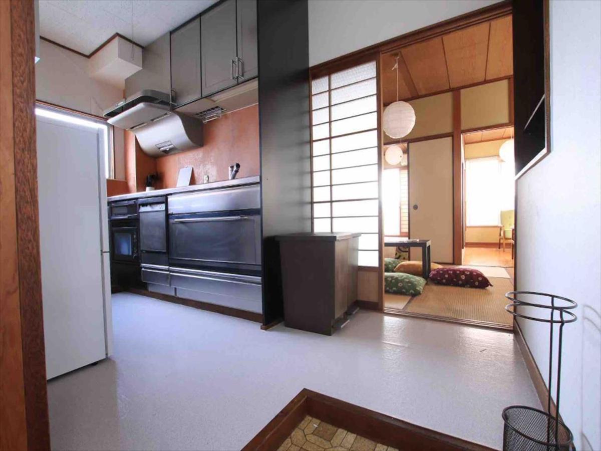 Goraku Shinfu-Kae Apartment Осака Екстериор снимка